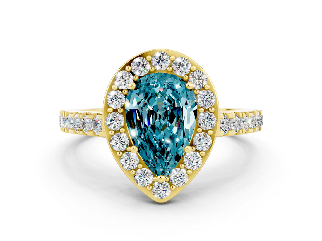 Yellow gold Pear Cut Halo Diamond Ring with Pavé Band and Three-Prong Setting