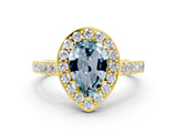Yellow gold Pear Cut Halo Diamond Ring with Pavé Band and Three-Prong Setting