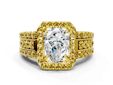 Yellow gold Pear Cut Halo Diamond Ring with Round with Yellow Sapphire side stone Split Shank and Prong Setting