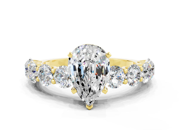 Yellow gold Pear Cut Moissanite Prong Setting with Side Stones on a Pave Band
