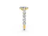 Yellow gold Pear Cut Moissanite Prong Setting with Side Stones on a Pave Band_2