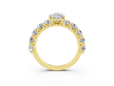 Yellow gold Pear Cut Moissanite Prong Setting with Side Stones on a Pave Band_3