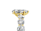 Yellow gold Pear Cut Moissanite Prong Setting with Side Stones on a Pave Band_5