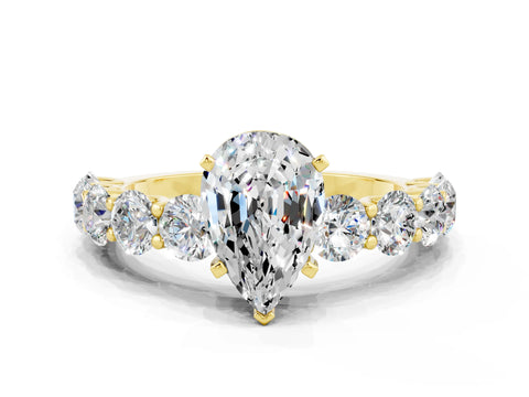 Yellow gold Pear Cut Moissanite Prong Setting with Side Stones on a Pave Band