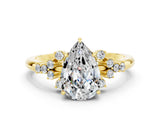 Yellow gold Pear Cut Moissanite Ring with Side Stones and Four-Prong Setting_36