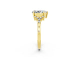 Yellow gold Pear Cut Moissanite Ring with Side Stones and Four-Prong Setting_38