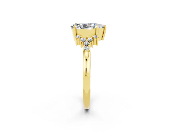 Yellow gold Pear Cut Moissanite Ring with Side Stones and Four-Prong Setting