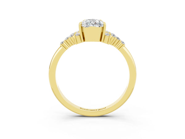 Yellow gold Pear Cut Moissanite Ring with Side Stones and Four-Prong Setting
