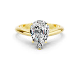 Yellow gold Pear Cut Moissanite Solitaire Engagement Ring with Cathedral Setting and Four-Prong Mount_24