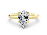 Yellow gold Pear Cut Moissanite Solitaire Engagement Ring with Round Band and Four-Prong Setting