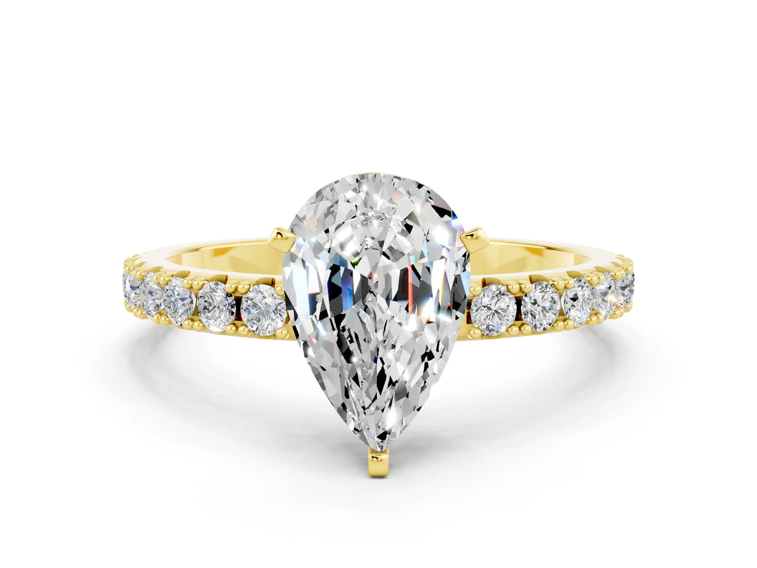 Yellow gold Pear Cut Moissanite Solitaire Pavé Band with Four-Prong Setting