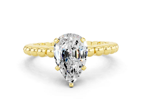 Yellow gold Pear Cut Moissanite Solitaire Ring with Beaded Band and Prong Setting