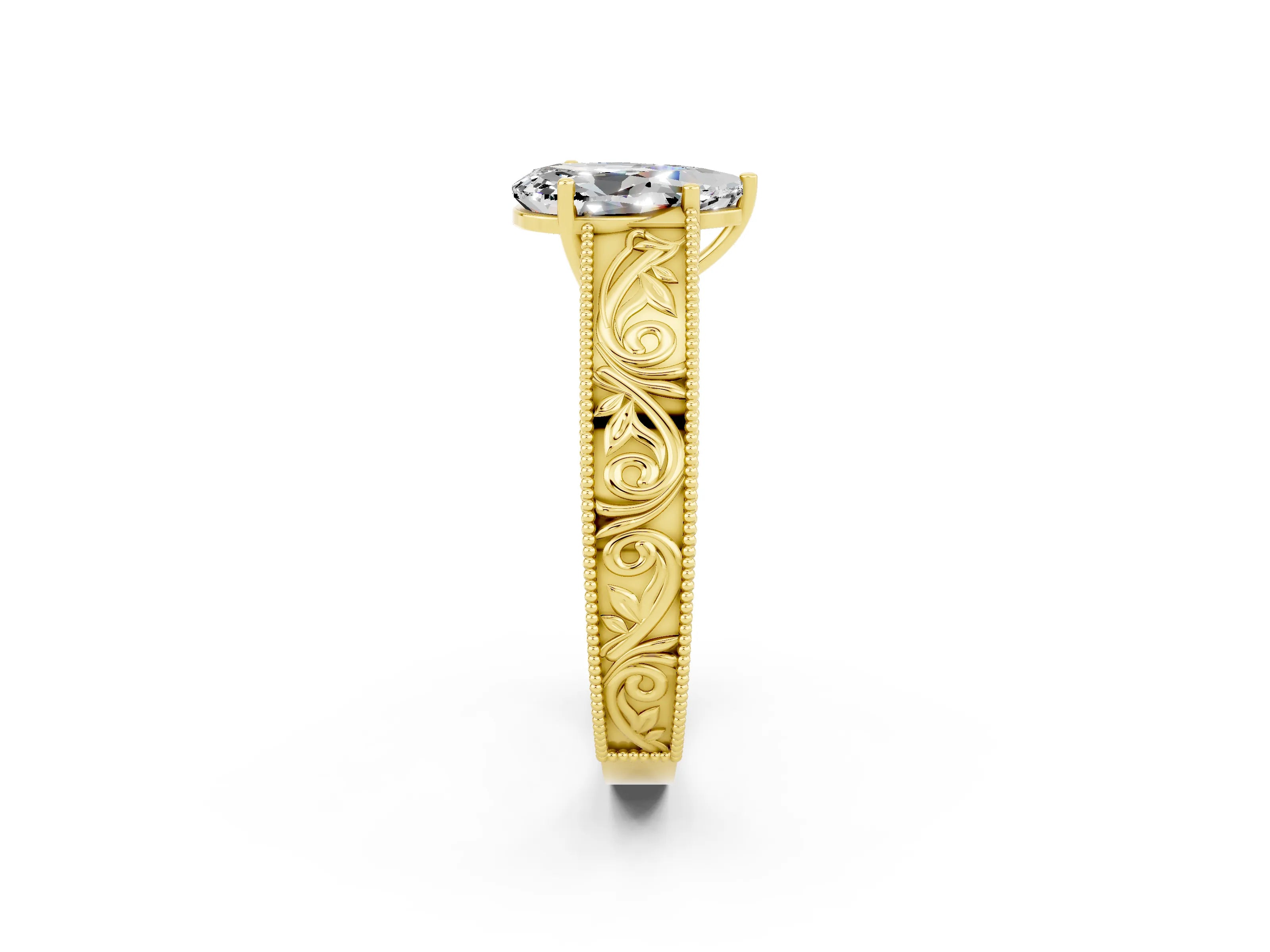 Yellow gold Pear Cut Moissanite Solitaire Ring with Engraved Band and Four-Prong Setting_2