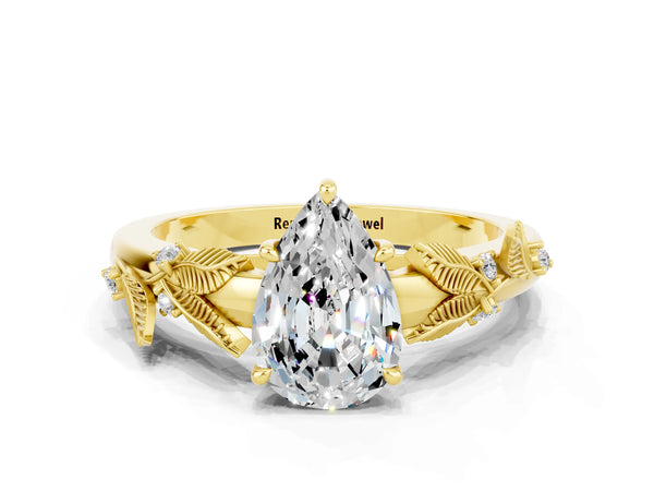 Yellow gold Pear Cut Moissanite Solitaire Ring with Leaf Motif Band and Four-Prong Setting