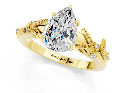 Yellow gold Pear Cut Moissanite Solitaire Ring with Leaf Motif Band and Four-Prong Setting_1