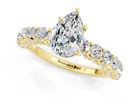 Yellow gold Pear Cut Moissanite Solitaire Ring with Shared Prong Pavé Band and Four-Prong Setting_1