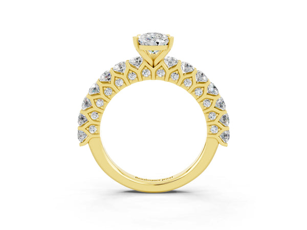 Yellow gold Pear Cut Moissanite Solitaire Ring with Shared Prong Pavé Band and Four-Prong Setting