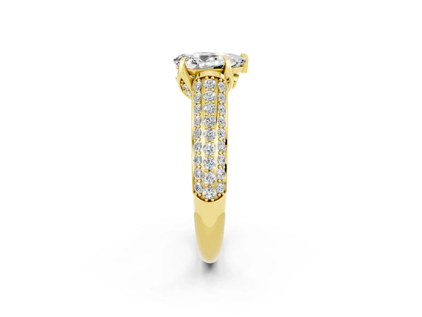 Yellow gold Pear Cut Moissanite Solitaire Ring with Three-Row Pavé Band and Four-Prong Setting