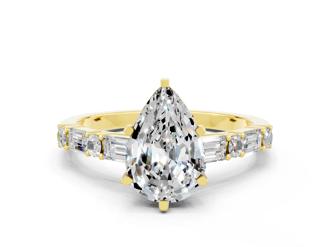 Yellow gold Pear Cut Moissanite Solitaire with Side Baguettes and Channel Set Band