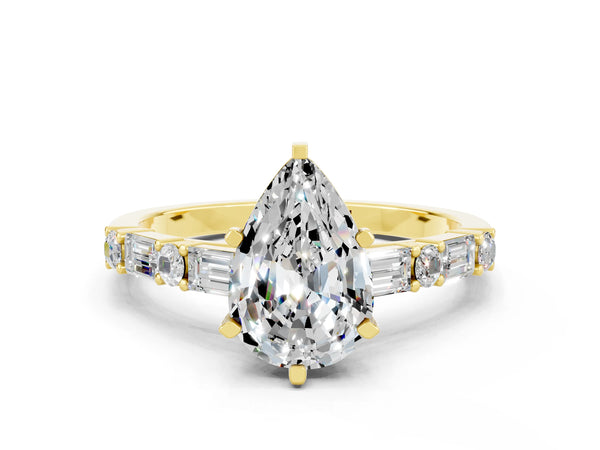 Yellow gold Pear Cut Moissanite Solitaire with Side Baguettes and Channel Set Band