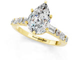 Yellow gold Pear Cut Moissanite Solitaire with Side Baguettes and Channel Set Band_1