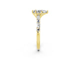 Yellow gold Pear Cut Moissanite Solitaire with Side Baguettes and Channel Set Band_2
