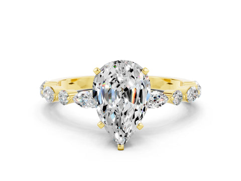 Yellow gold Pear Cut Moissanite Solitaire with Side Stones on a Pavé Band and Four-Prong Setting