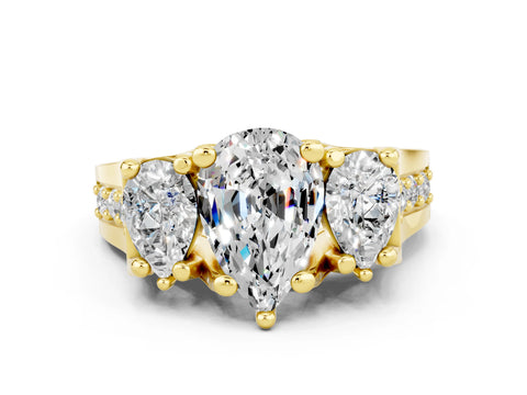 Yellow gold Pear Cut Moissanite Three-Stone Ring with Channel Set Band and Four-Prong Setting