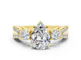 Yellow gold Pear Cut Moissanite Three-Stone Ring with Pavé Split Shank and Four-Prong Setting_12