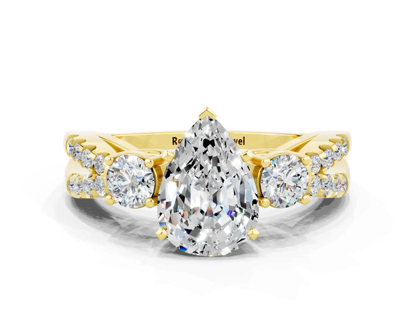 Yellow gold Pear Cut Moissanite Three-Stone Ring with Pavé Split Shank and Four-Prong Setting