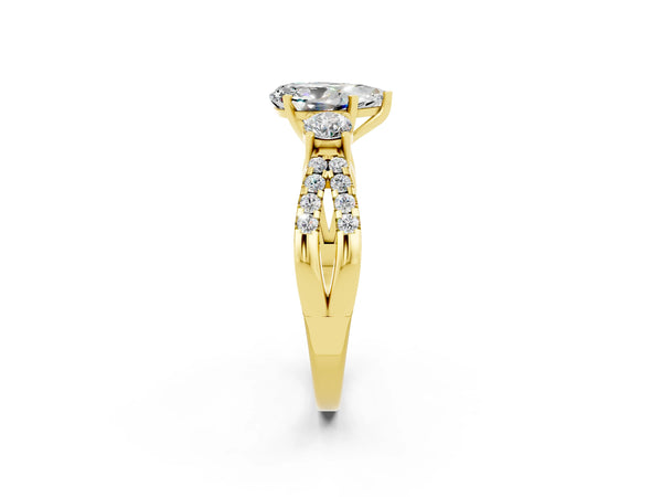 Yellow gold Pear Cut Moissanite Three-Stone Ring with Pavé Split Shank and Four-Prong Setting