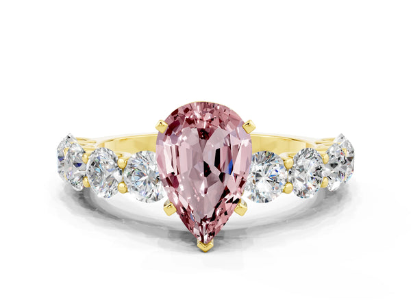 Yellow gold Pear Cut Morganite Prong Setting with Side Stones on a Pave Band
