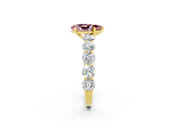 Yellow gold Pear Cut Morganite Prong Setting with Side Stones on a Pave Band