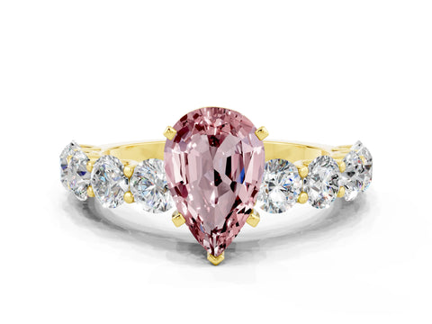 Yellow gold Pear Cut Morganite Prong Setting with Side Stones on a Pave Band