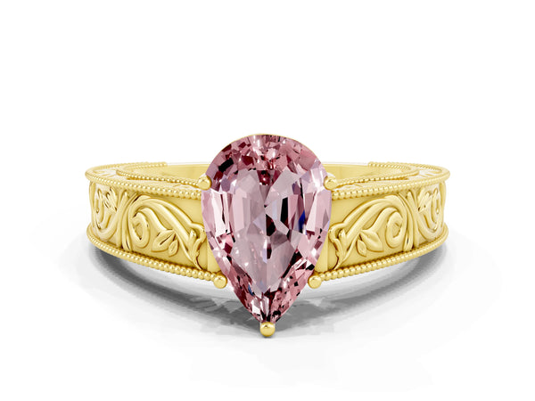 Yellow gold Pear Cut Morganite Solitaire Ring with Engraved Band and Four-Prong Setting