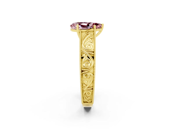 Yellow gold Pear Cut Morganite Solitaire Ring with Engraved Band and Four-Prong Setting