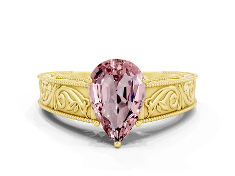 Yellow gold Pear Cut Morganite Solitaire Ring with Engraved Band and Four-Prong Setting
