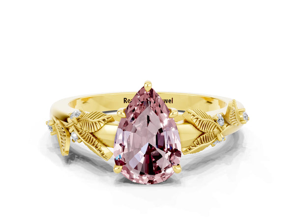 Yellow gold Pear Cut Morganite Solitaire Ring with Leaf Motif Band and Four-Prong Setting
