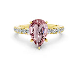 Yellow gold Pear Cut Morganite Solitaire Ring with Pavé Accents and Four-Prong Setting