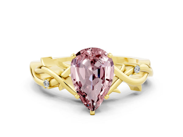 Yellow gold Pear Cut Morganite Solitaire Ring with Twisted Band and Prong Setting