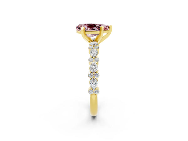 Yellow gold Pear Cut Morganite Side Stone Solitaire Ring with Round  and Four-Prong Setting