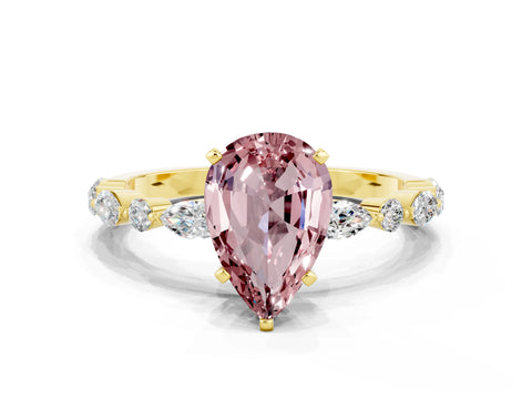 Yellow gold Pear Cut Morganite Solitaire with Side Stones on a Pavé Band and Four-Prong Setting