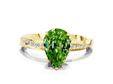 Yellow gold Pear Cut Peridot Engagement Ring with Side Stone Accents and Four-Prong Setting_60