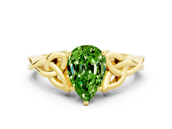 Yellow gold Pear Cut Peridot Solitaire Celtic Knot Ring with Four-Prong Setting