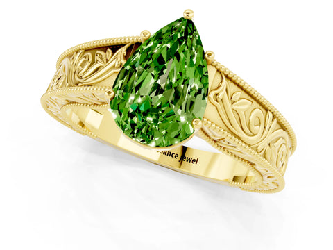 Yellow gold Pear Cut Peridot Solitaire Ring with Engraved Band and Four-Prong Setting_1