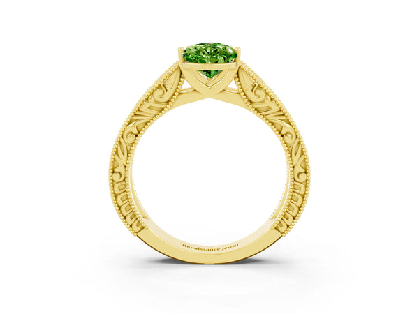 Yellow gold Pear Cut Peridot Solitaire Ring with Engraved Band and Four-Prong Setting
