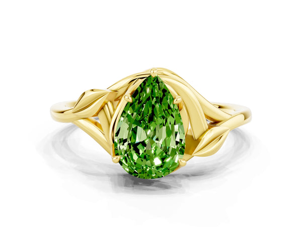 Yellow gold Pear Cut Peridot Solitaire Ring with Twist Band and Four-Prong Setting