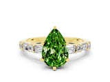 Yellow gold Pear Cut Peridot Solitaire with Side Baguettes and Channel Set Band