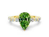 Yellow gold Pear Cut Peridot Solitaire with Side Stones on a Pavé Band and Four-Prong Setting