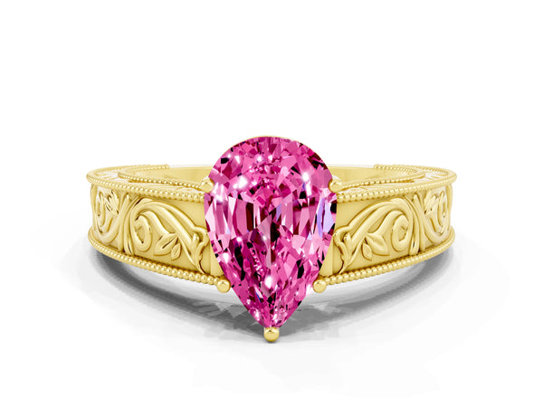 Yellow gold Pear Cut Pink Sapphire Solitaire Ring with Engraved Band and Four-Prong Setting